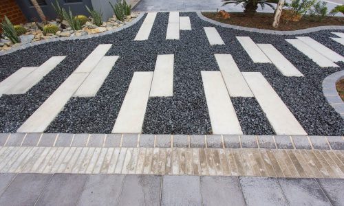 1200x300x60mm-Concrete-Slab-with-resin-bound-stones-creating-a-stepping-stone-walkway