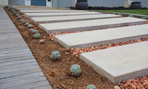 1800-x-450-x-80mm-Concrete-Slab-in-Grey-used-as-stepping-stones-to-create-a-walkway
